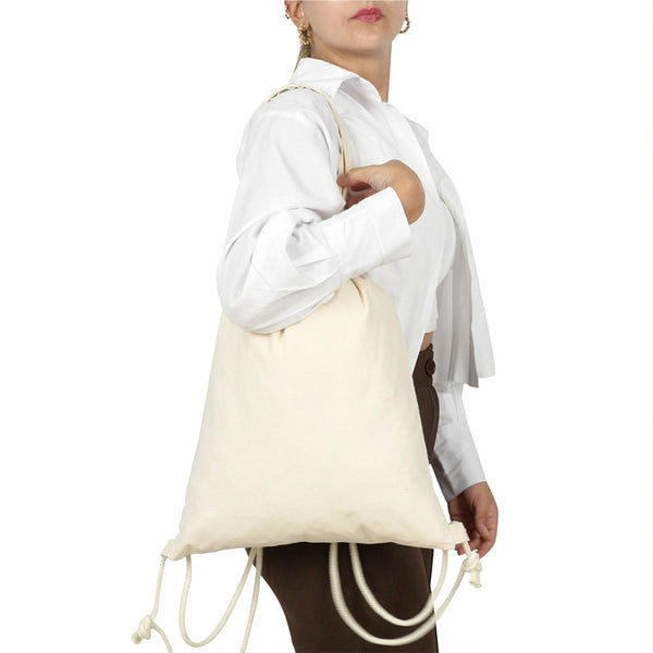 Sac à dos à cordon de Noël porté à l'épaule – Pamusan.fr