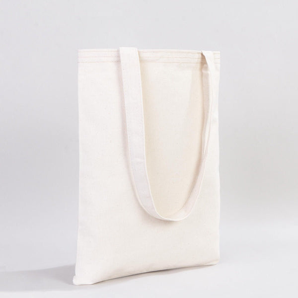 White tote bag on a light gray background