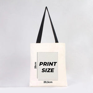 Tote bag avec informations sur les dimensions de l'impression sur fond gris clair chez Pamusan.