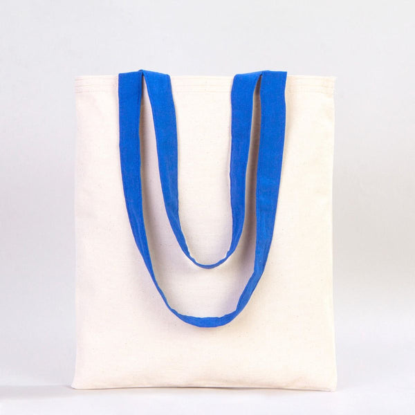 White tote bag with blue handles on a light gray background