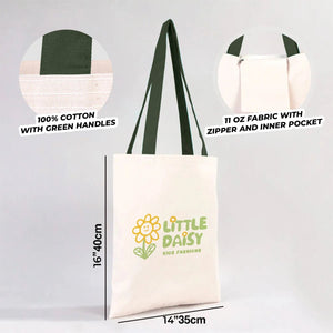 Tote bag blanc avec marquage Little Daisy, anses vertes et détails sur la composition du tissu pour Pamusan.
