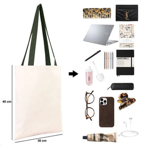 Composition d'articles variés incluant un tote bag, un ordinateur portable, des carnets, un téléphone et des accessoires Pamusan sur fond blanc.