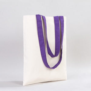 White tote bag with purple handles on a light gray background