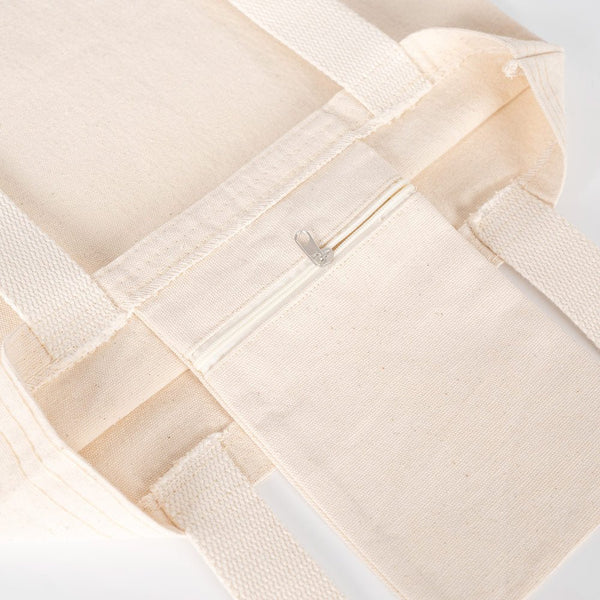 Close-up of a beige woven fabric with a white background